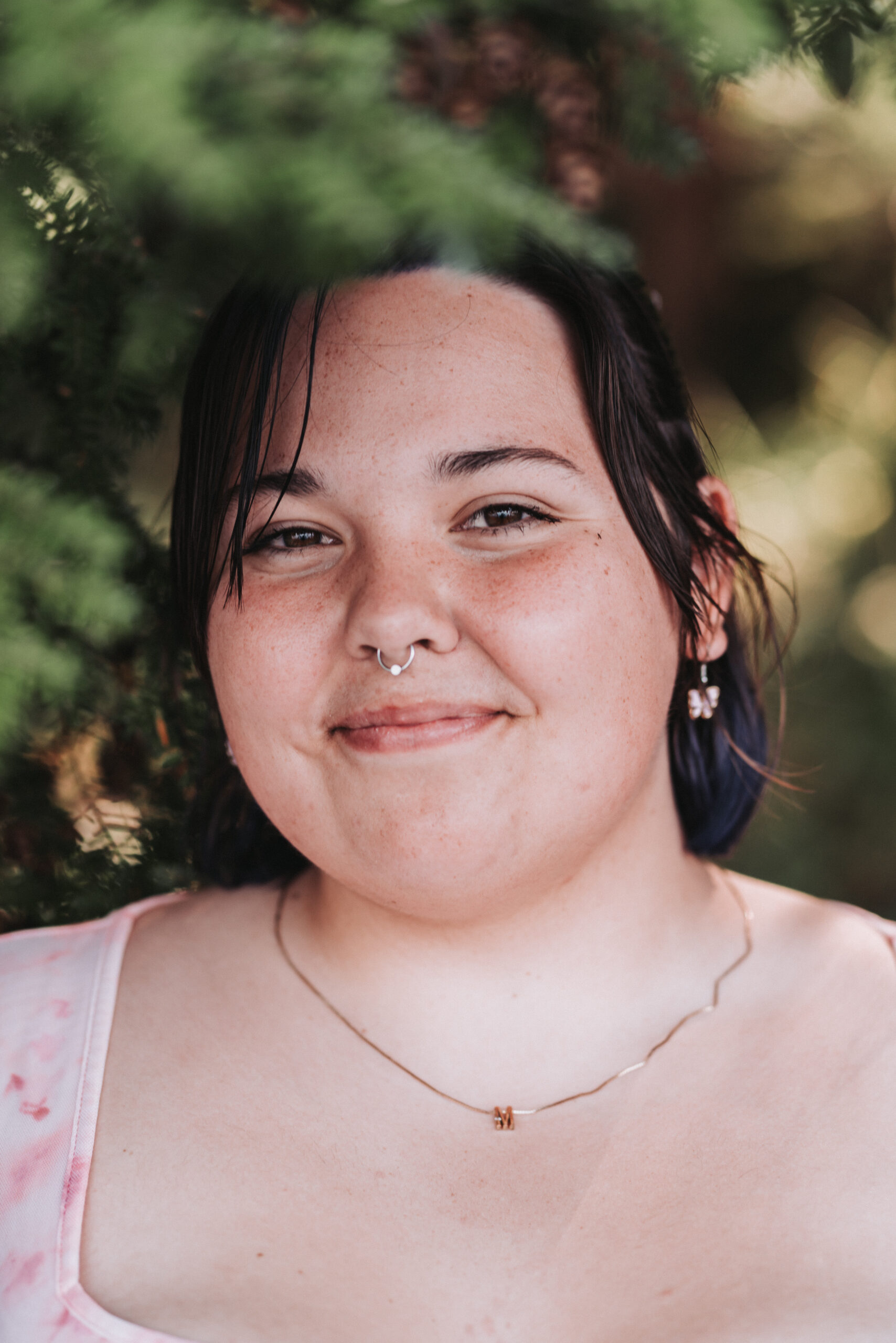 Photo of Amelia Miller, greenery in the background